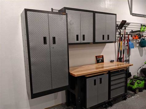 Features abound as well, with perforated "peg board-style" door interiors and a nice two-point locking security door. . Gladiator vs kobalt garage cabinets